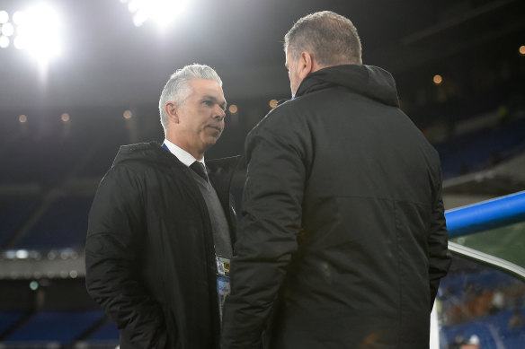 Steve Corica speaks with Ange Postecoglou after Sydney FC's 4-0 defeat to Yokohama F. Marinos.
