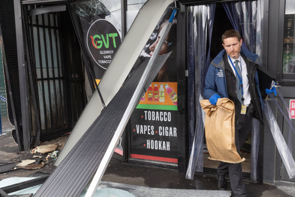 Police at the scene of a tobacco shop fire in Glenroy on October 9.