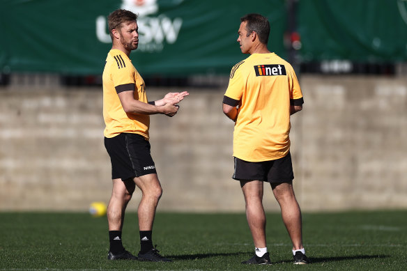 Sam Mitchell and Alastair Clarkson last year.