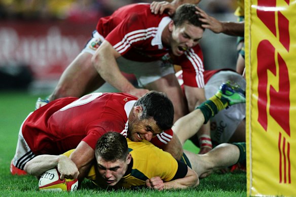 James O’Connor scores for Australia against the Lions in the third Test in 2013.