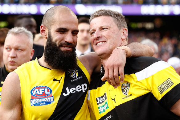 Bachar Houli (left) with coach Damien Hardwick after Richmond’s 2017 grand final win.