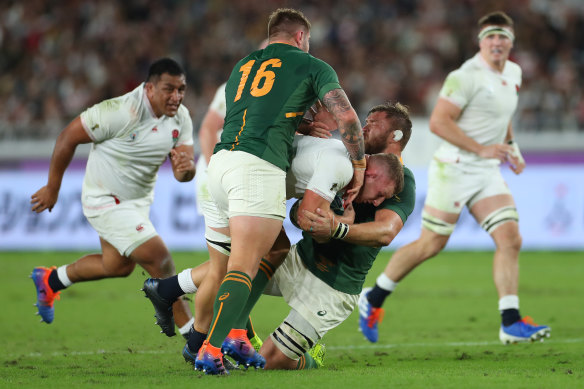 Duane Vermuelen makes a tackle in the Rugby World Cup final in 2019.