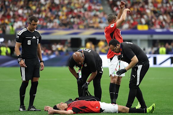 Karim Hafez receives medical attention.