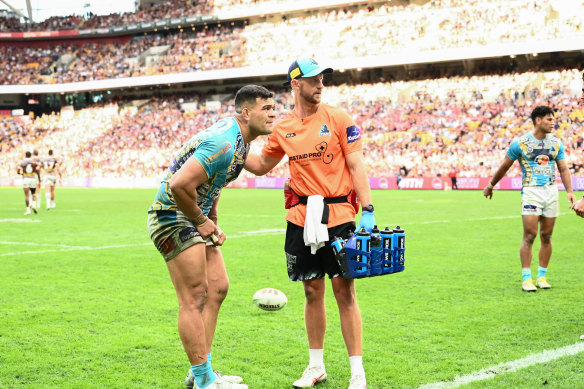David Fifita is assessed for a head injury during the Titans’ win over the Broncos.