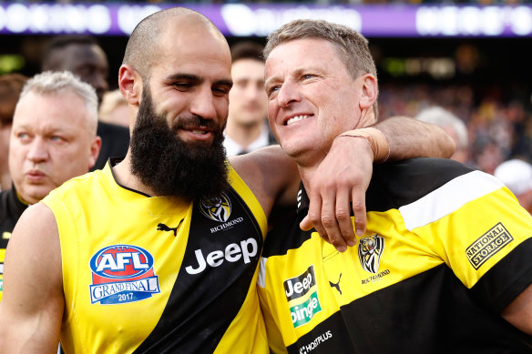 Bachar Houli (left) with coach Damien Hardwick after Richmond’s 2017 grand final win.