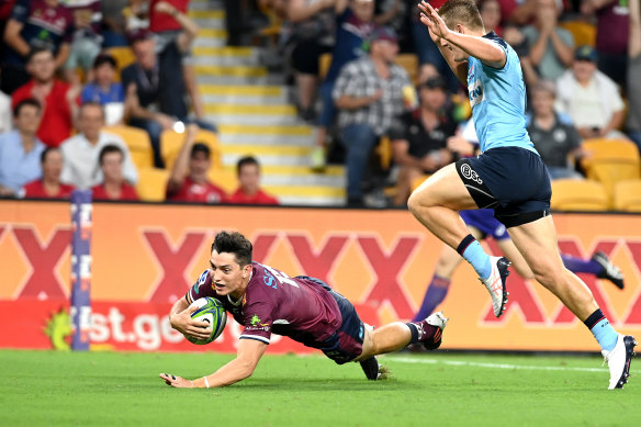 Jock Campbell, seen scoring for the Reds, says his priority would be helping Queensland overcome a run of quarter-final defeats in Super Rugby before considering his international career