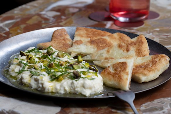 Stracciatella with pistachio, honey and fried bread