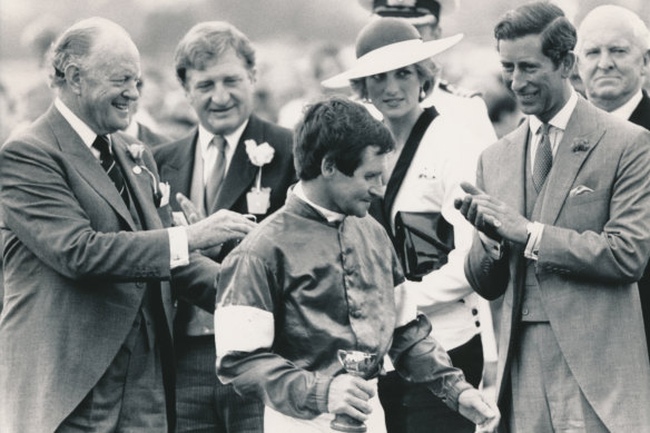 Charles and Dianna congratulate winning jockey Pat Hyland who rode What a Nuisance to win in 1985.