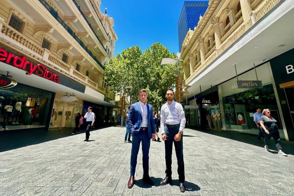JLL general manager Angelo Amara and economist Ronak Bhimjiani in the heritage building-lined Hay Street Mall.