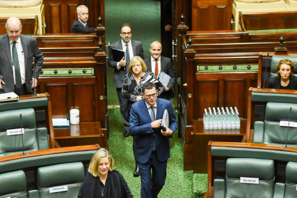 Daniel Andrews arrives for question time with some of his remaining cabinet colleagues in tow. 