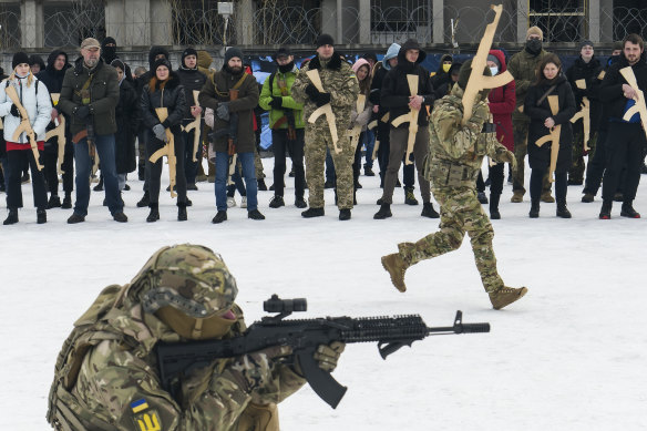 Ukrainian civilians take part in military training in Kyiv this week.