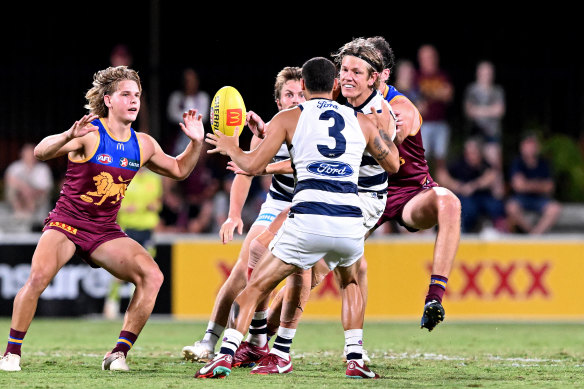 Rhys Stanley of the Cats gets a handball away in the loss to the Lions at Springfield.
