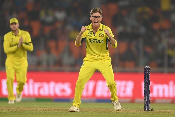 Australian spinner Adam Zampa of Australia celebrates the wicket of Moeen Ali of England.