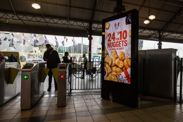 An advert for KFC at Flinders Street Station.