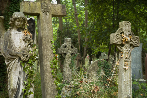 An angel guarding a grave at Highgate Cemetery, London