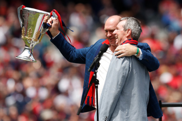 David Neitz and Neale Daniher with the cup at the MCG.