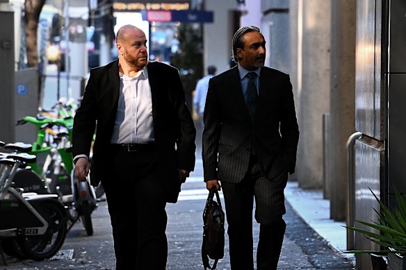 President of the Australian National Imams Council, Sheikh Shadi Alsuleiman (left) arrives at the Royal Commission on Antisemitism and Social Cohesion. 
