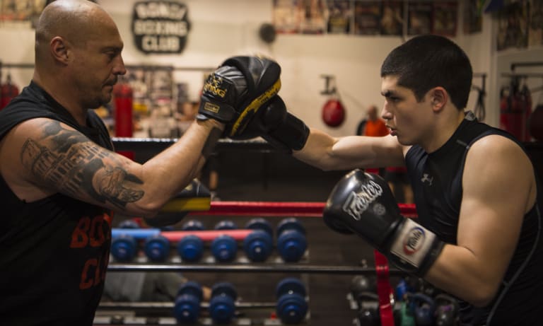 Kid gloves: Anton Markovic trains with Tony Del Vecchio in Waterloo.