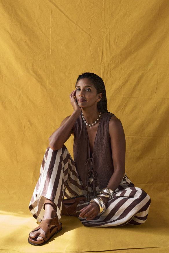 Zara waistcoat, $70. Elka Collective “Lumi” pants, $269. Lucy Folk “Pisces” choker, $750. Dinosaur Designs bangles, from $55 (worn throughout). A.Emery “Jalen” sandals, $220 (worn throughout).
