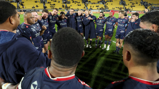 The Rebels form a huddle at the end of their final Super Rugby game.