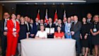 IFM chairman Cath Bowtell (seated left) signs a memorandum of understanding on behalf of Australian superannuation funds to cooperate with Canadian pension funds on investments, overseen by Canadian prime minister Mark Carney.