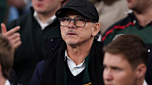 Incoming Australia coach Les Kiss looks on.