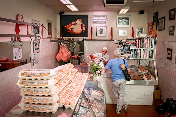 The shop is decorated with artwork and fresh flowers while classical music plays all day.