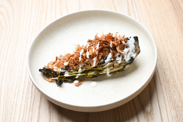 Braised then grilled sugarloaf cabbage with smoked yoghurt and fried shallots.