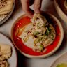 Wood-fired, toum-brushed flatbread with labne soaked in chilli oil.