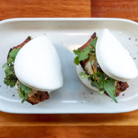 Bao bun with pork, Davidson plum and kimchi. 