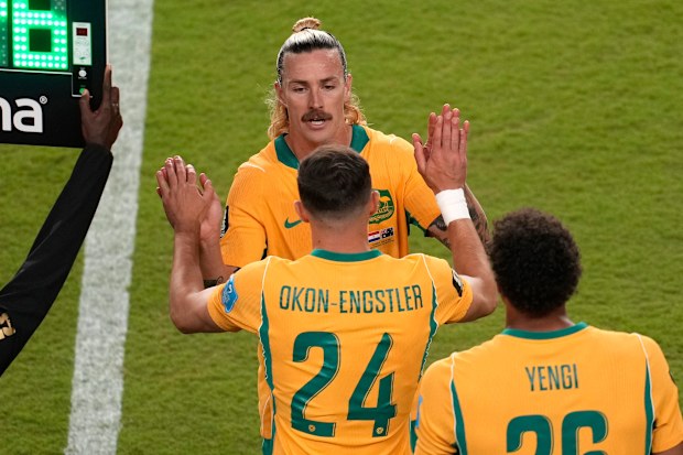 Jackson Irvine subs out for Paul Okon-Engstler.