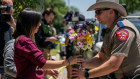 The Uvalde township lays flowers outside the school where the children were shot dead.