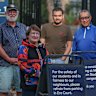Era Court residents Ken and Andrea Eldridge, Pasha Memon and Andre Chin want Carey Grammar to keep the school bus service.