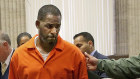 R. Kelly leaves a hearing at the Leighton Criminal Court building, in Chicago.