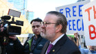 Bernie Finn on the steps of Parliament amongst his supporters after being kicked out of the Liberal party. 