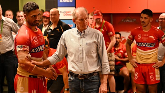 Wayne Bennett addresses his players in the sheds after the round one win over the Roosters.