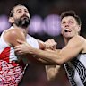 Grundy and Oscar Steene compete in the ruck.