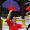 Bankstown residents gather most days to practise Chinese Tai Chi led by 90-year-old master Wang at Paul Keating park.