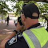 Queensland Police enforcing bicycle and scooter speeds on Brisbane’s Goodwill Bridge.