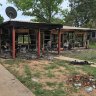 An image from a New Year's Day riot at Aurukun, where six houses were destroyed by fire.