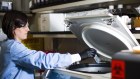 A research associate works at the Moderna Therapeutics Inc. lab in Cambridge, Massachusetts, US which has had positive results for a vaccine.