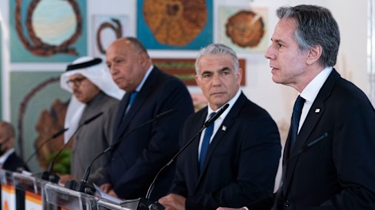 At the Negev Summit, from left, Bahrain’s Foreign Minister Abdullatif bin Rashid al-Zayani, Egypt’s Foreign Minister Sameh Shoukry, and Israel’s Foreign Minister Yair Lapid, listen as U.S. Secretary of State Antony Blinken speaks during a news conference, Monday, March 28, 2022, in Sde Boker, Israel. (AP Photo/Jacquelyn Martin, Pool)