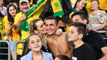 Hero: Tim Cahill enjoys his moment in the spotlight with his family ahead of a well-earned holiday.