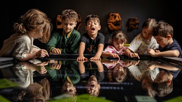 Kids flocked to an interactive game in the middle of the exhibition hall at the museum.