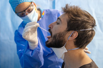 A man is tested for COVID-19 at a medical centre in Madrid.