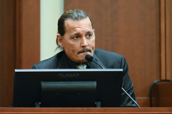 Actor Johnny Depp testifies during a hearing at the Fairfax County Circuit Court in Fairfax, Virginia.