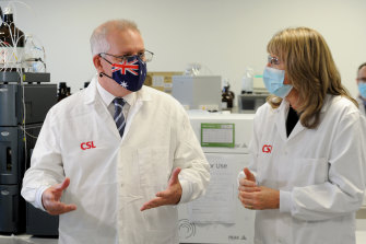 Prime Minister Scott Morrison meets CSL staff working on the AstraZeneca vaccine in Melbourne in March. 
