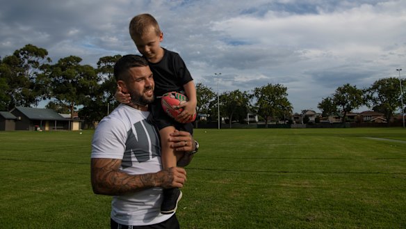 Family man: Adam Reynolds and four-year-old son Kobe enjoy a quiet moment in Mascot.
