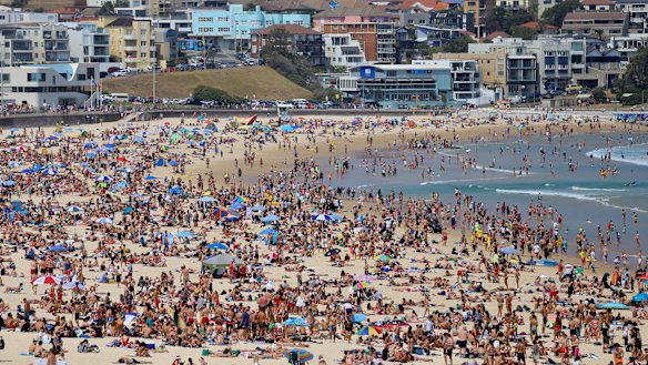 Crowds of people at Bondi beach on Christmas Day.