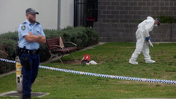 NSW Forensic Services investigating at a crime scene where a man was killed in January 2018 near  Hurstville Train Station.